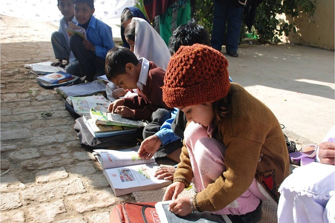 Children doing schoolwork.