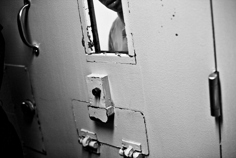 A teenager is held in solitary confinement at a youth prison west of Chicago. Photo credit: © Carlos Javier Ortiz/Redux Young inmate at the window of a prison cell
