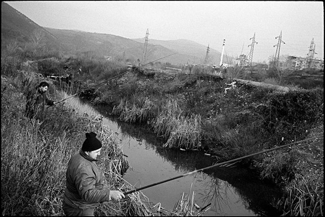 Roma who have been displaced across borders face immense difficulties proving residency in order to register as citizens. Without land titles or civil registration documents, the Roma can neither return to their homes nor exercise their rights as displaced persons to recover or be compensated for their possessions. Photo credit: © Balazs Gardi/VII Network Two men fishing in a river