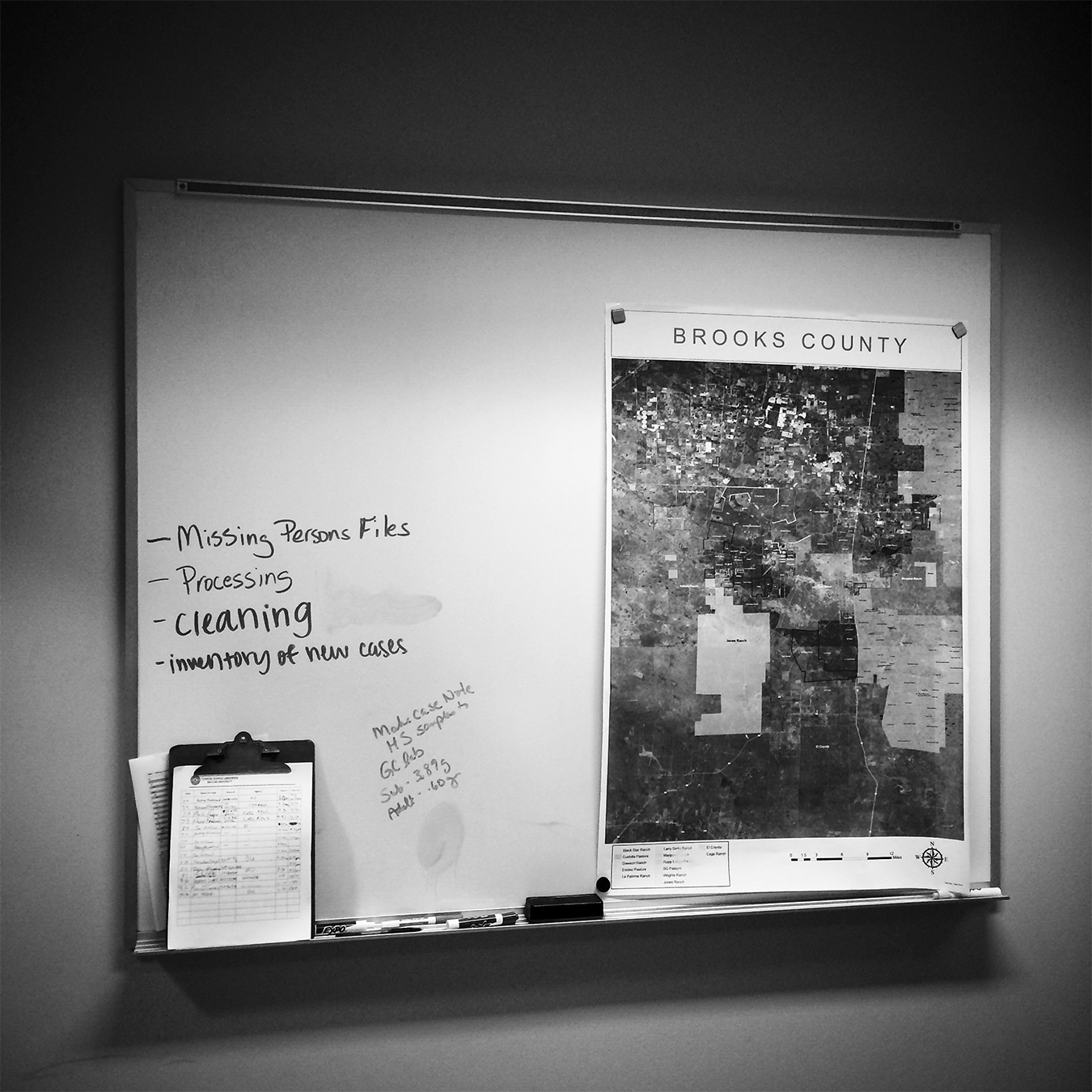 Map and whiteboard with notes