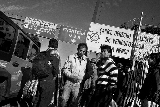 A man walking away from the border