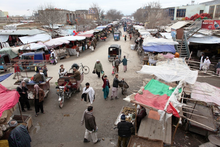 Vendors line the street at an outdoor market in Kunduz, Afghanistan, in February 2011. Photo credit: © Ton Koene/Newscom Street market