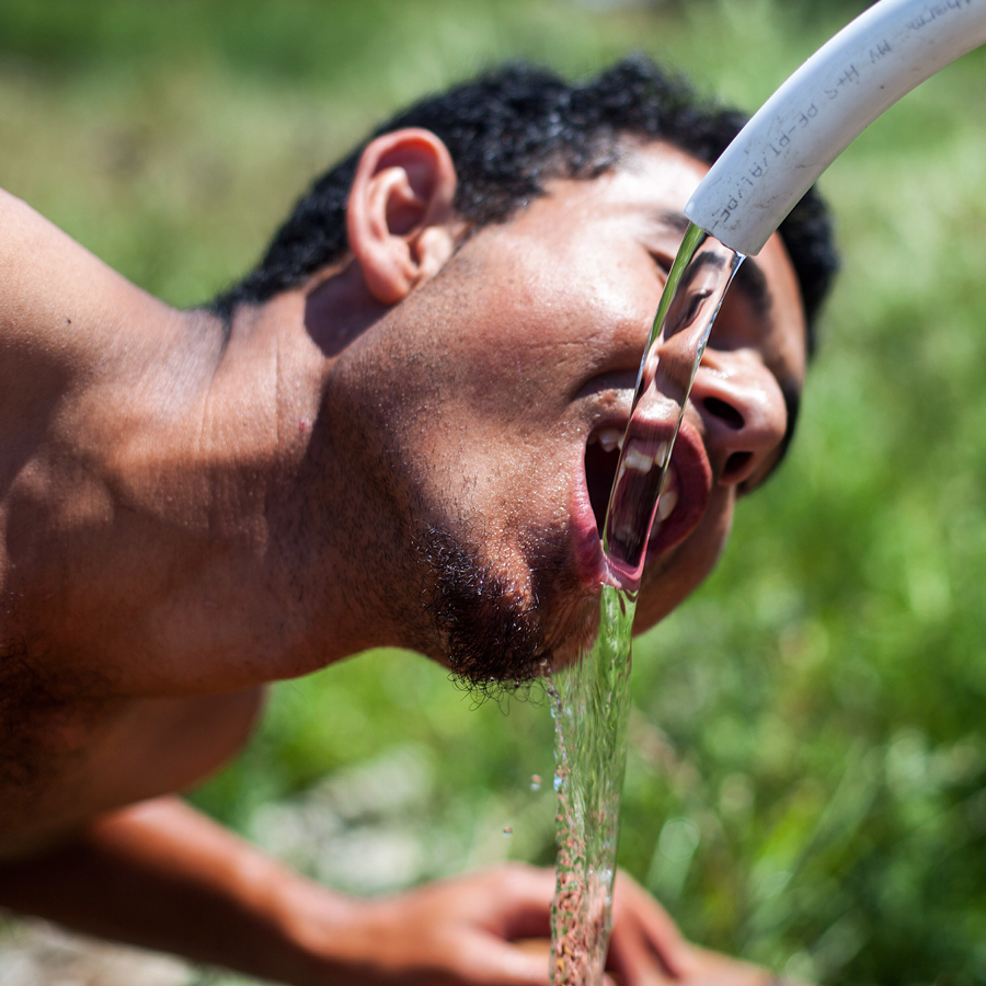 A man drinking water