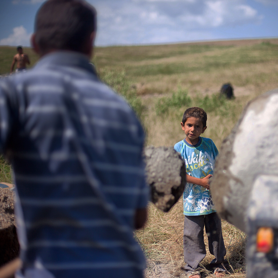 A man and child working