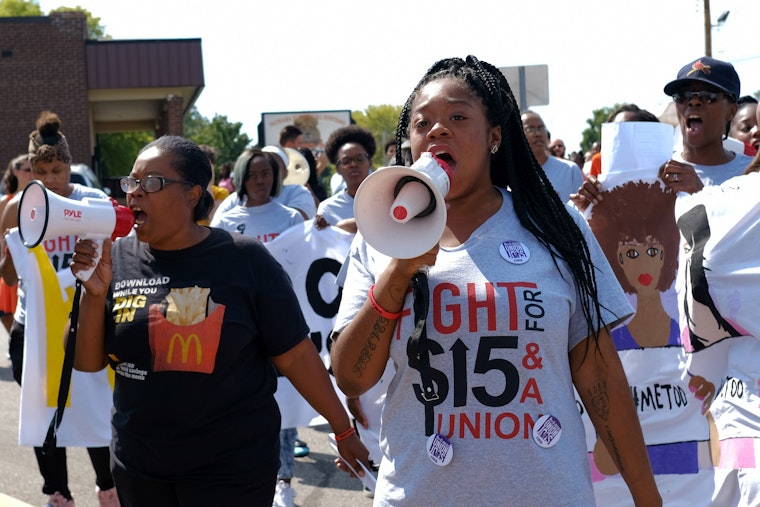 Demonstrators call for a rise in the minimum wage and union representation in St. Louis, Missouri, on September 18, 2019. Photo credit: © Nick Schnelle/NYTimes/Redux People protesting with megaphones