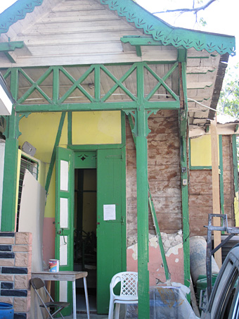 House with green doors and trim