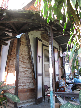 Woman sitting on porch