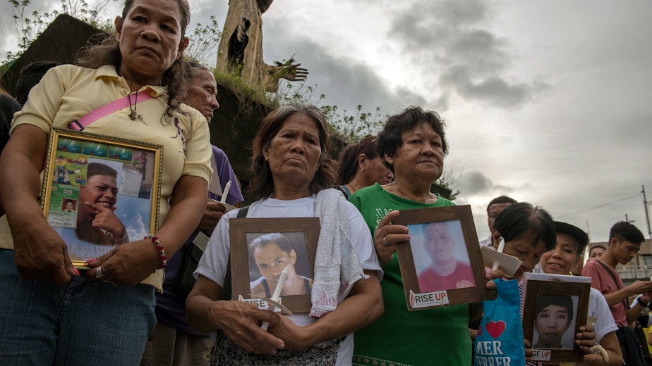 Relatives and friends mourn victims of extrajudicial killings related to the war on drugs in Manila, Philippines, on November 5, 2017.