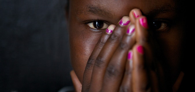 legal-aid-in-congo-20120227 Female with hands covering her face