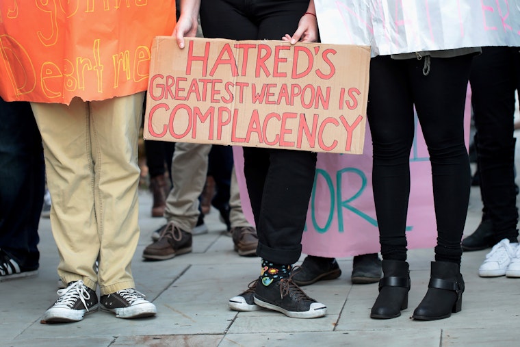 Students at the University of Chicago protest President-Elect Donald Trump in Chicago on November 15, 2016. Photo credit: © Scott Olson/Getty Students holding protest posters