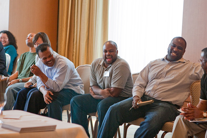 Shawn Dove and others sitting and laughing