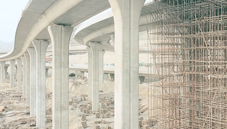 Still from Moving Walls 20: Ian Teh. “Traces: Landscapes in Transition on the Yellow River Basin” documents the effects of modern China’s rampant development and assertive economic drive on the Yellow River in quiet and subtle panoramic landscapes. Highway overpass under construction