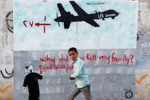 Grafitti art of a drone aircraft on a wall