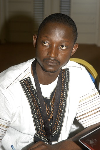Frank Musukwa attending an Africa Youth with Disability Network meeting in July 2012. Photo credit: © Abdul Aziz Badji Frank Musukwa, man sitting