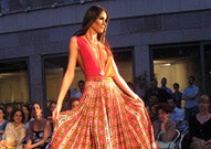 Woman wearing dress on catwalk