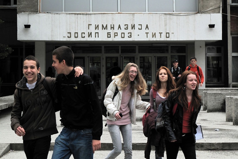 A group of teenagers leaving school