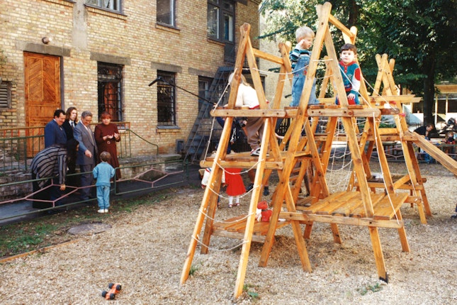 Children on an outdoor play structure