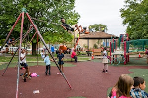 Children on swings at a playground