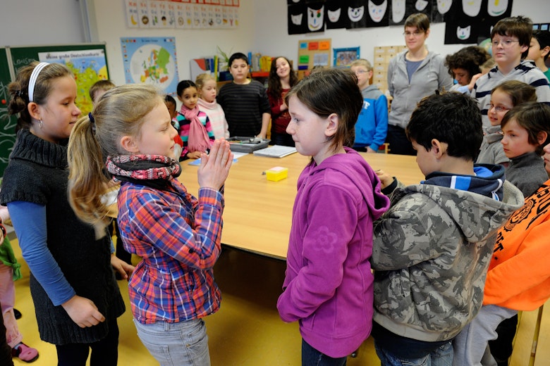Students learn and play together in an inclusive classroom in Germany.