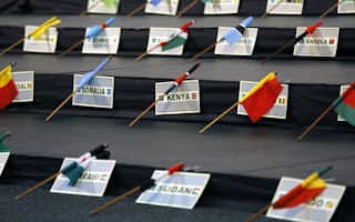 The flags from many African countries on display at a meeting of the African Union in Johannesburg, South Africa. Photo credit: © Kim Ludbrook/EPA/Shutterstock The flags from many African countries set on tables