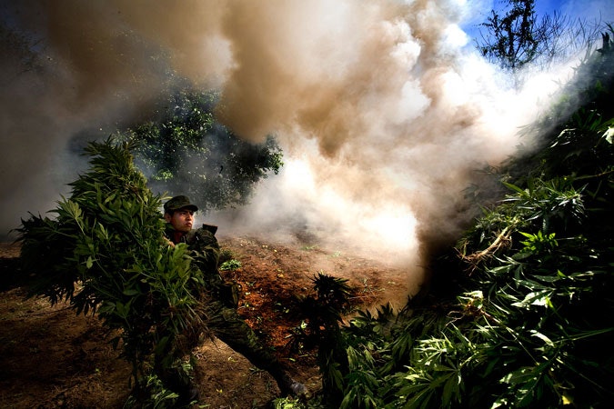 Solider burning Marijuana. 