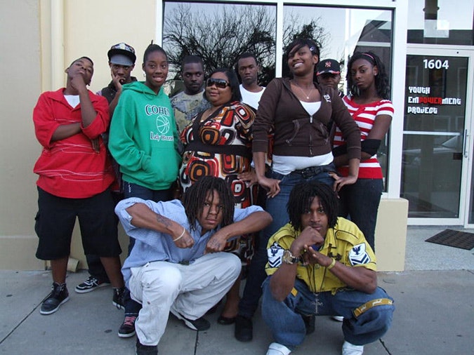 nola-youth-20100830 Group of YASS participants pose on sidewalk