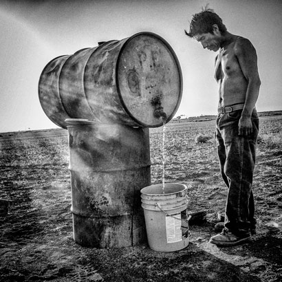 A man and water drum