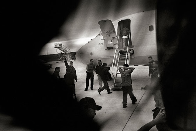Men boarding a plane