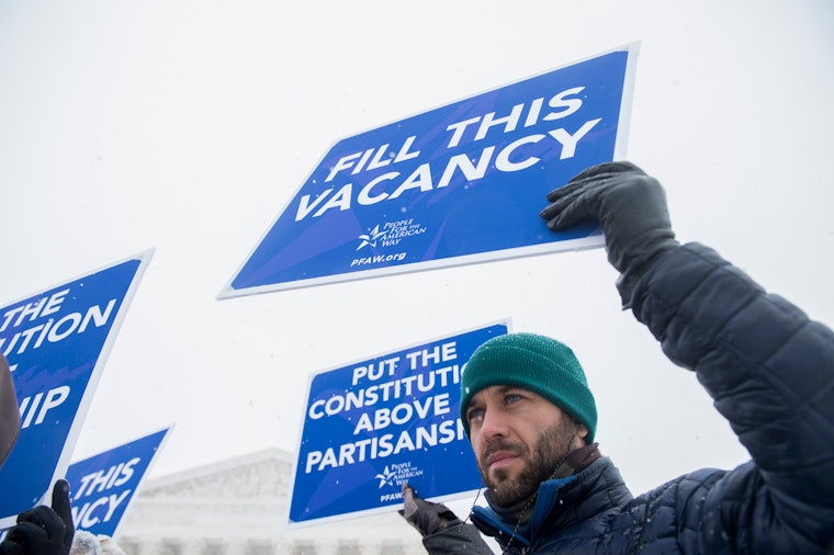 Demonstrators call on Congress to give fair consideration to President Obama’s nominee to the Supreme Court on February 15, 2016. Photo credit: © Bill Clark/Newscom Demonstrators outside the U.S. Supreme Court