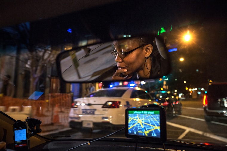 A driver at night in Washington, D.C.