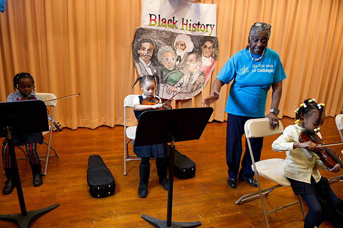 Girls playing the violin