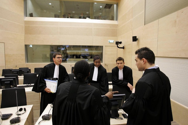 Judges talking in a court room